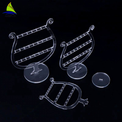 Présentoirs tournants acryliques de boucle d'oreille de maquillage de luxe clair