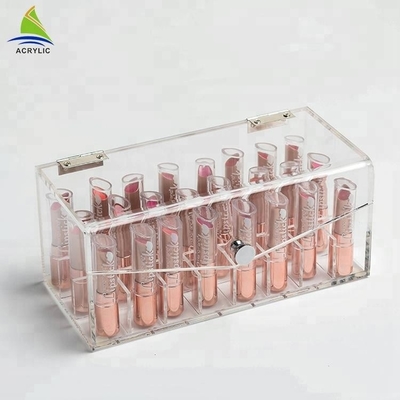 La vitrine acrylique transparente de rouge à lèvres de maquillage composent l'organisateur