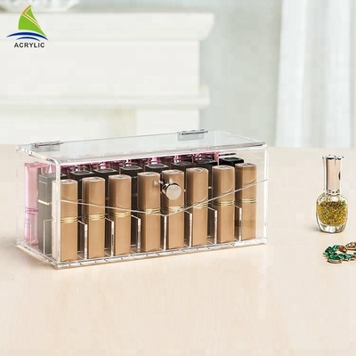 La vitrine acrylique transparente de rouge à lèvres de maquillage composent l'organisateur