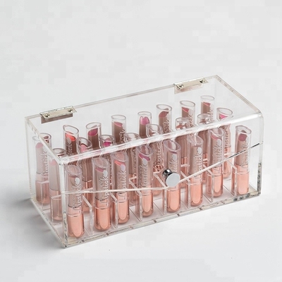 La vitrine acrylique transparente de rouge à lèvres de maquillage composent l'organisateur